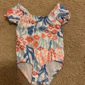 Sweetest little suit with bow in back!